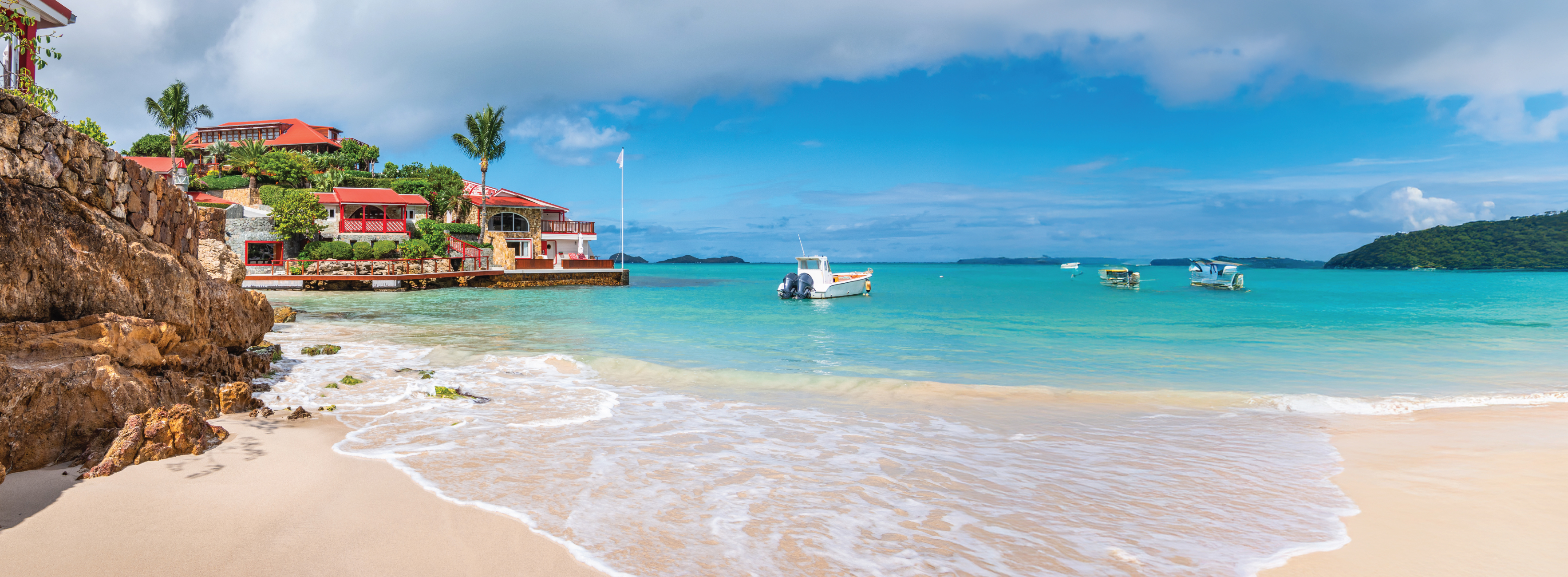 Tropical beach with turquoise waters.